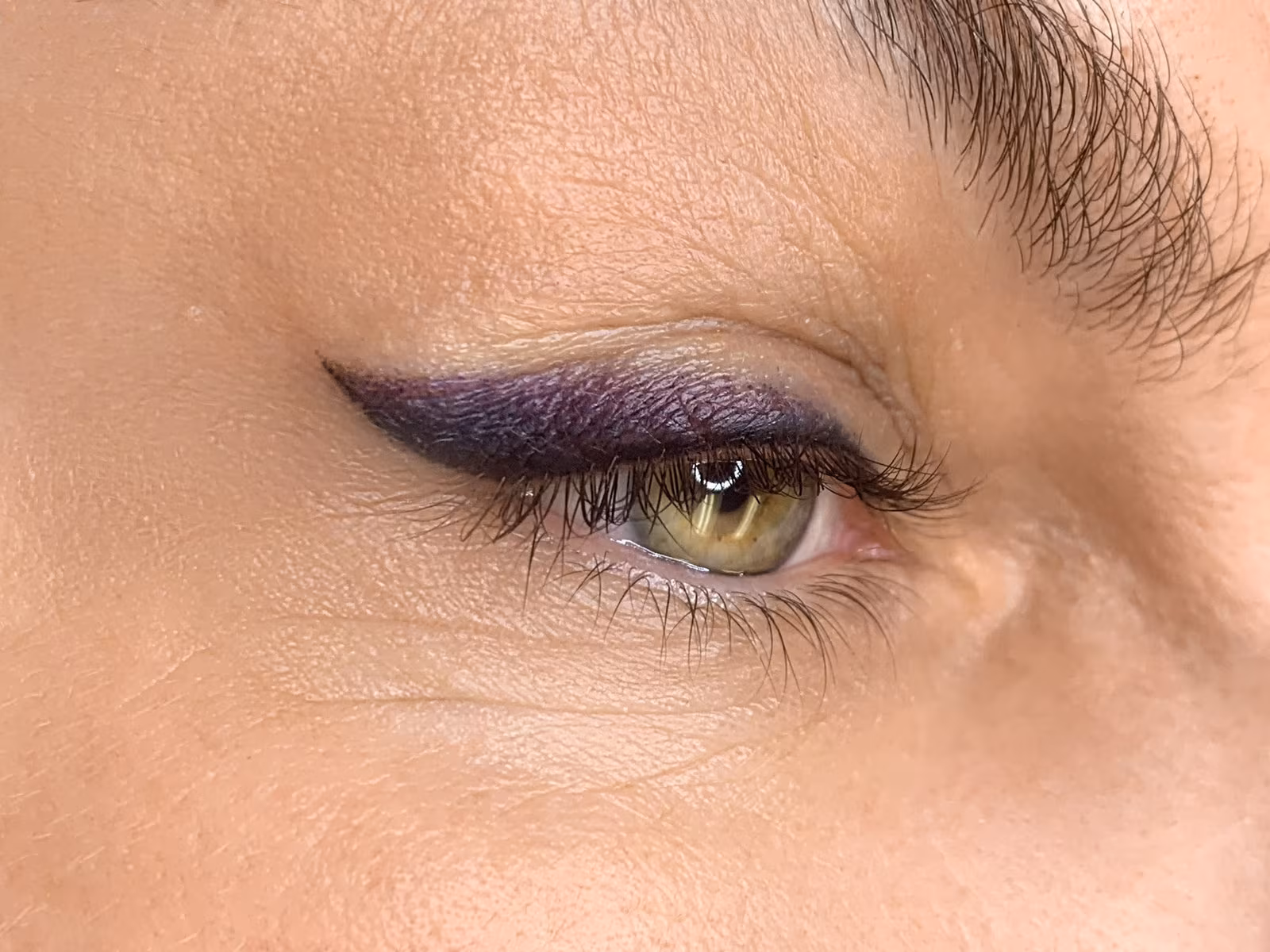 Foxyline tattoo result with soft winged shadow effect