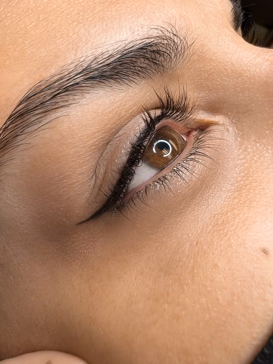 Winged eyeliner tattoo result along the upper lash line, Calypso Beauty, Kirkland WA